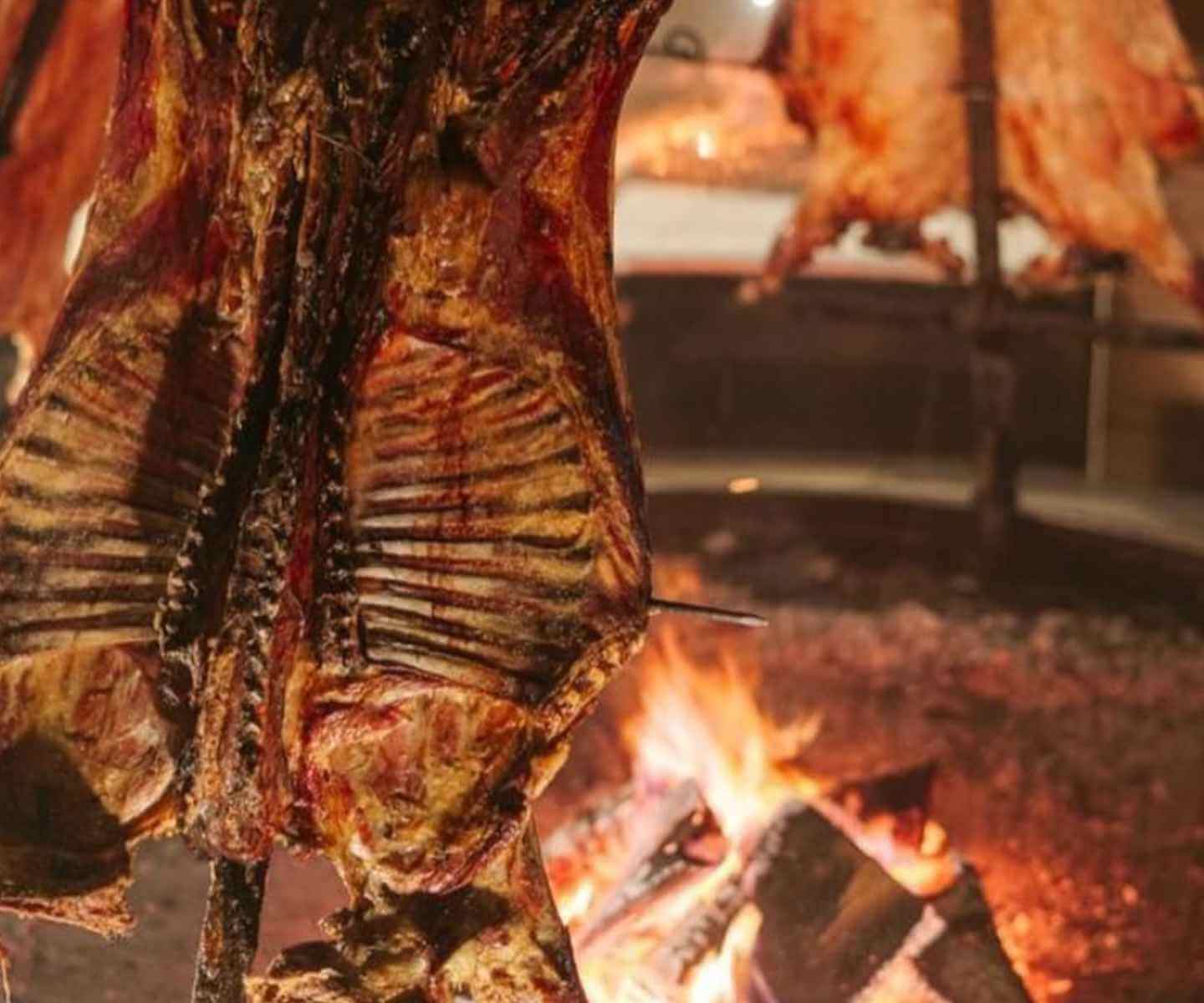 Patagonian lamb on a spit (asador). Image taken from Instagram (@latablitaelcalafate)
